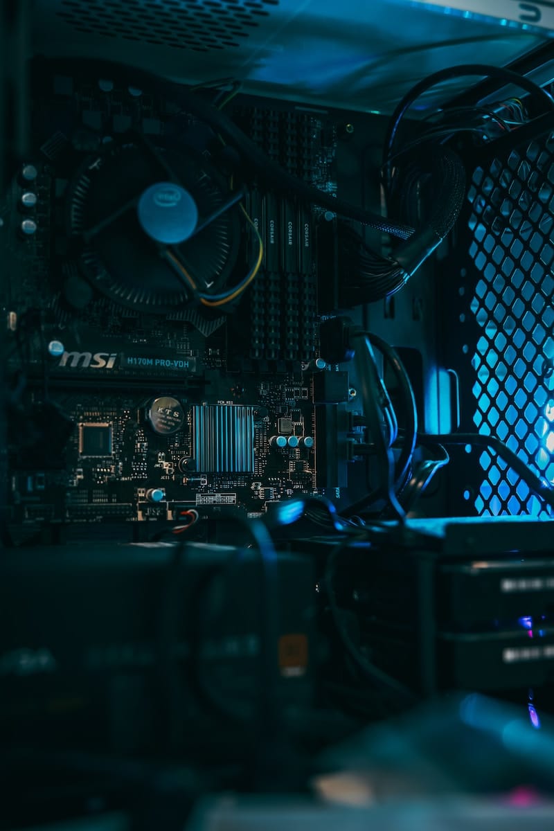 a close up of a computer motherboard with many wires